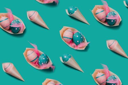 Pattern with colored decorated eggs in bamboo cones look like ice cream and boat plates on green...