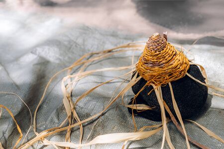 Handmade weaving basket in process of making. Craft workshop. Close up shot.の写真素材
