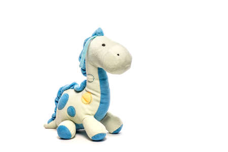 Toy dinosaur isolated on white background, soft fluffy toyの写真素材