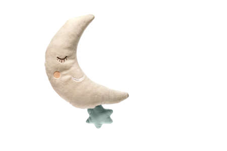 Toy moon with star isolated on white background, soft fluffy toyの写真素材