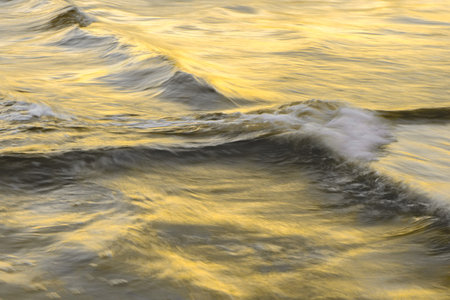Motion blur abstract water background in trendy colors 2021. Gray and Yellowの写真素材