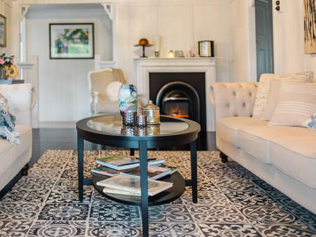 Big and comfortable living room with bright sofaの写真素材