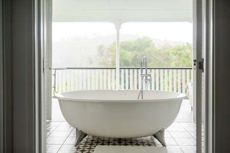 View of a spacious and elegant bathroom.の写真素材