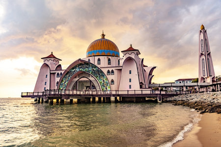 Melaka Straits Mosque Masjid Selat Melaka at sunset light Melaka Malaysiaのeditorial素材