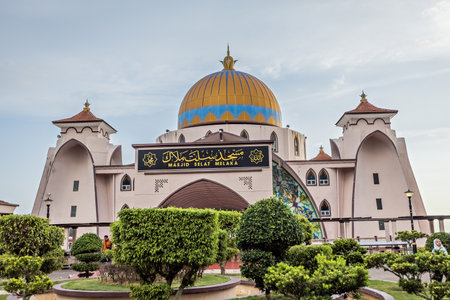 Melaka Straits Mosque Masjid Selat Melaka at sunset light Melaka Malaysiaのeditorial素材