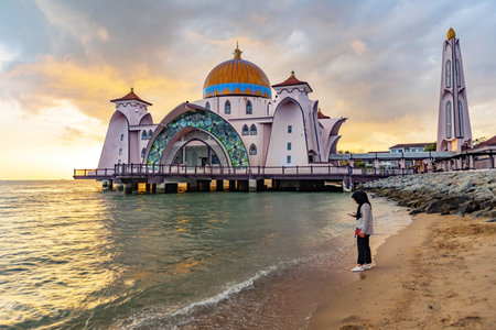 Melaka Straits Mosque Masjid Selat Melaka at sunset light Melaka Malaysiaのeditorial素材