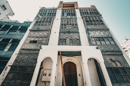 Traditional architecture of old Jeddah town El Balad district houses with wooden windows and balconies Unesco Heritage site in Jeddah Saudi Arabiaのeditorial素材