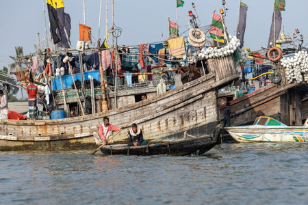 Boats on the water in Cox's Bazar sea port people travelling to another island by boats Bangladesh