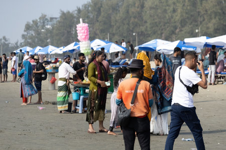 Crowd of people on the Cox's Bazar public beach Bangladesh