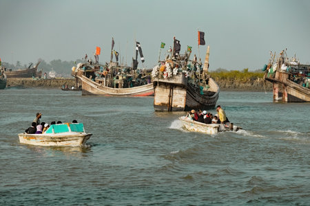 Boats on the water in Cox's Bazar sea port people travelling to another island by boats Bangladesh