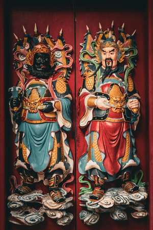 Traditional Chinese temple wooden doors in Tua Pek Kong Temple outside details in Kuching Sarawak Malaysiaのeditorial素材