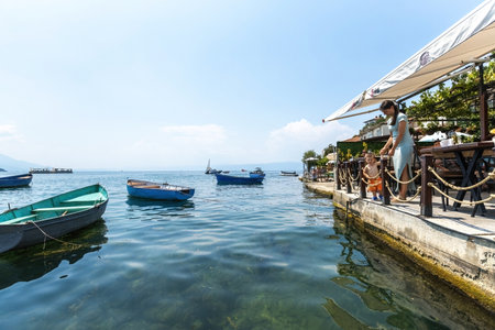 Boats and the old houses at the shore of Ohrid lake North Macedonia