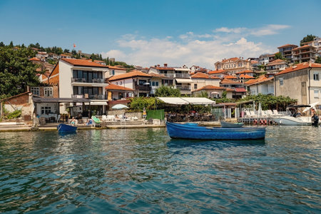 Boats and the old houses at the shore of Ohrid lake North Macedoniaのeditorial素材
