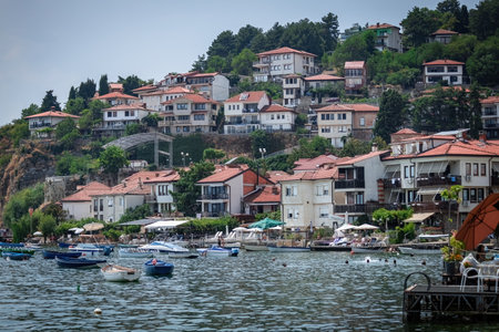 Boats and the old houses at the shore of Ohrid lake North Macedonia