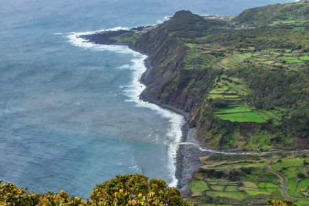 Breathtaking view on the Atlantic ocean coast aerial view green fields and the ocean Azores Portugalの写真素材