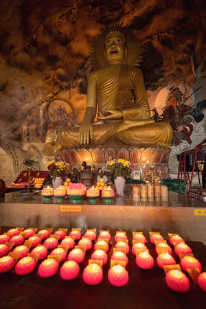 Buddha statue in Perak cave temple Ipoh Malaysiaの写真素材