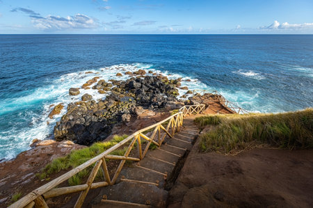 Breathtaking view of the wavy Atlantic ocean from the cliff in Azores islands Portugalの写真素材