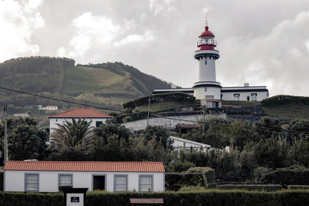 Farol Da Ponta Do Topo Lighthouse distant view in Sao Jorge Azores Portugal