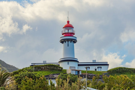 Farol Da Ponta Do Topo Lighthouse distant view in Sao Jorge Azores Portugalの写真素材