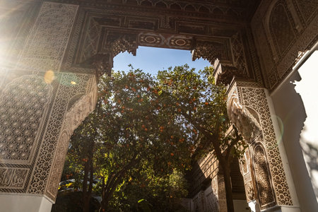 Facade arch building of Bahia Palace in the Marrakesh Medina old town Morocco