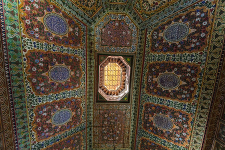 Ornate carvings of the ceiling in Bahia Palace in the Marrakesh Medina old town Morocco