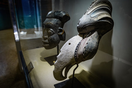 Old African wooden mask used for tribal dance and rituals in african countries like Senegal, Congo, Cameroon in the Museum of Black Civilizations Dakarのeditorial素材