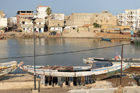 Old painted fishing traditional boat in St. Louis Senegalのeditorial素材