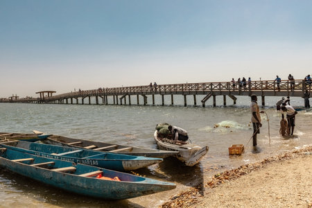 Fishing boats on the beach at Joal Fadiouth the shell island Senegalのeditorial素材