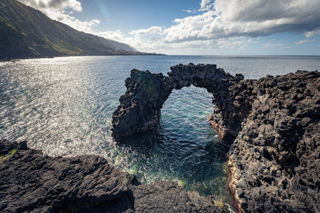 Breathtaking view of the wavy Atlantic ocean from the cliff in Azores islands Portugalの写真素材