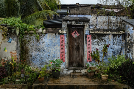 Old abandoned Chinese house details outside view in Papan Heritage village Perak Malaysiaのeditorial素材