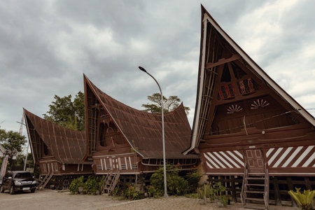 Traditional Toba batak houses with pointed roofs at Samosir island at Toba lake North Sumatra...