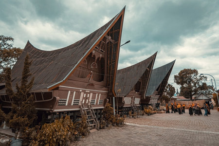 Traditional Toba batak houses with pointed roofs at Samosir island at Toba lake North Sumatra...