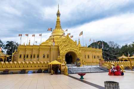 Golden Buddhist stupa in Taman Lumbini temple in Berastagi, Sumatra, Indonesia