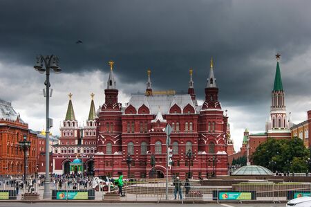 Dark clouds thickened over Moscow, red Moscow, historic buildings, old architecture, disturbing August, cold summer, the Kremlinの写真素材