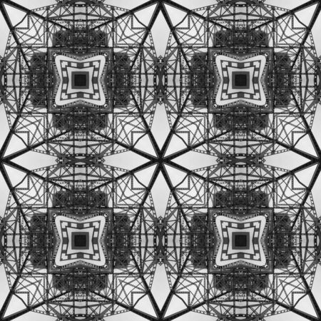 Kaleidoscope from industrial photo - architecture, metal lace, pattern, patchwork. Background for site or blog, packaging, textiles. Grayscale. Black and white pattern. Contrast, geometry, harmonyの写真素材