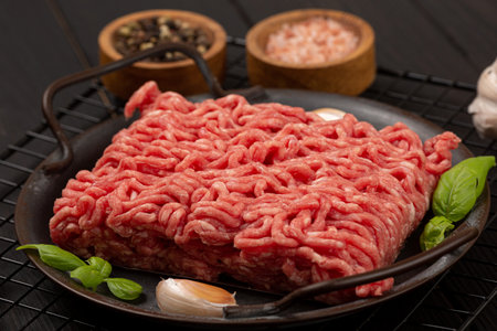 Raw homemade minced meat on a tin plateの写真素材