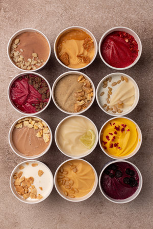 Assorted craft natural ice cream in paper bucketsの写真素材