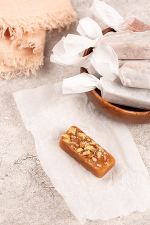 Creamy toffee with nuts, handmade, close-up