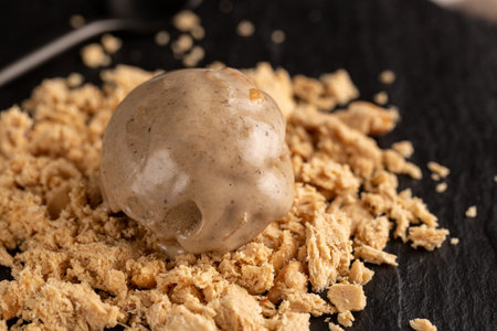 A ball of peanut halva-flavored ice creamの写真素材