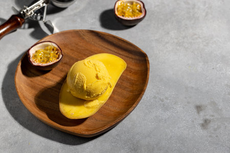 Mango and passion fruit ice cream ball