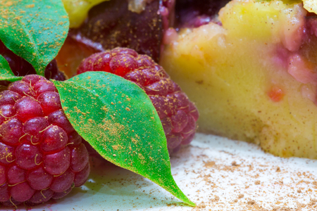 Raspberry clafoutis fruit pie. Plum with apple and cinnamon. の写真素材