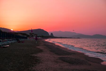 Pink sunrise on the beach. Italy. Summertime. の写真素材