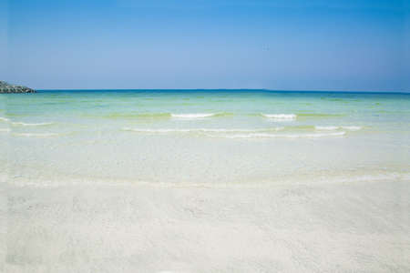 Summer beach background. White beach and green sea background. Nature background. の写真素材