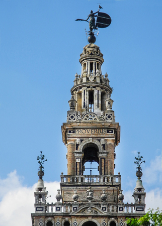 Giralda tower in Sevilla, Spain. Blue sky background.  Moorish architecture.の写真素材