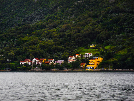 Kotor bay, Montenegro. View from boat, different building and mountains.