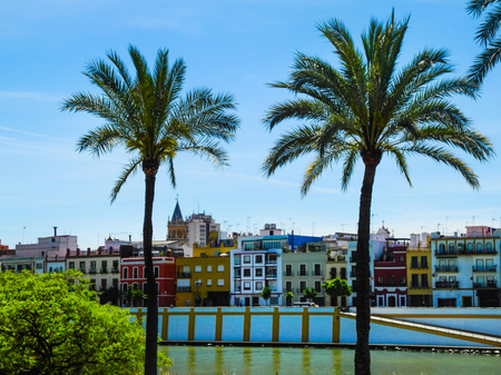 Sevilla Guadalquivir river front in bright summer day, Andalusia, Spain.