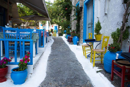 Kos, Greece - 24 July 2018. Greece taverna in Kos island. Traditional blue and white kolors.