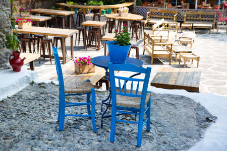 Kos, Greece - 24 July 2018. Greece taverna in Kos island. Traditional blue and white kolors.のeditorial素材
