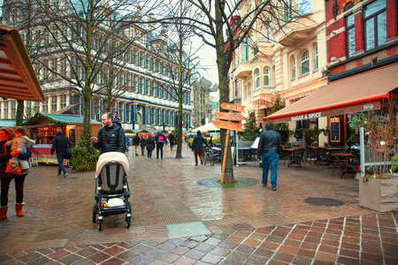 16 December 2019, Ghent, Belgium. People with families attend Christmas market.