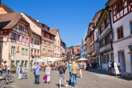 August 23, 2017 Stein am Rhein, Switzerland. Tourists in the downtown, old beautiful buildings.のeditorial素材